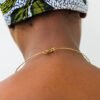 MWINYI African brass and cowrie necklace